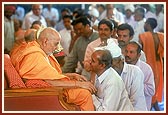 Swamishri blesses and advices the devotees during samip darshan