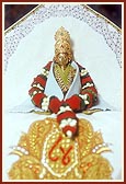 The only reference that today is Pramukh Swami Maharaj's 84th birthday was on Thakorji's attire