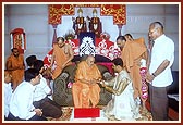 Swamishri blesses a youth for his marriage