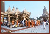 Performs pradakshina