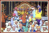 Swamishri with children and youths after their dance performance