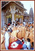 Swamishri blesses a disabled child&nbsp;
