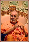Swamishri watches the Youth Day program