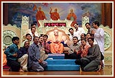Volunteers with Swamishri after their performance