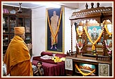 Swamishri engaged in darshan of murtis in the small mandir hall
