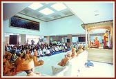 Swamishri blesses the doctors and staff in the hospital foyer