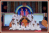 Swamishri with BAPS children after their drama presentation