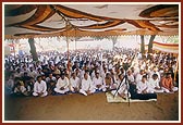 Swamishri addressing the tribal volunteers 