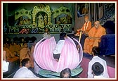 Swamishri inaugurates the 40th anniversary celebration of APC by lighting the lamp