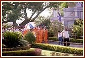 Swamishri on his way to perform his morning puja