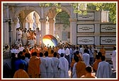 After darshan at the mandir Swamishri proceeds to perform his morning puja