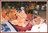 "Sonana bor jhule Dharmakishore..." Swamishri rejoices by playing the kartal while sadhus and devotees rock Shri Harikrishna Maharaj in conclusion to the Hari Jayanti festival 