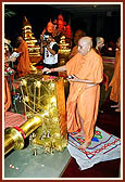 Swamishri performs pujan of the Dhwaj-dand (flagstaff)