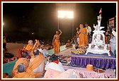 Sadhus dance to the festive bhajans and rhythms 