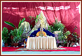 Performs his morning puja