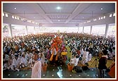 Devotees in the 'Gunatit Sabha Mandap'
