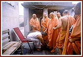 Swamishri walks through the narrow gullies and lanes of Bhadra village