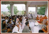 Swamishri blesses the satsang assembly in the mandir