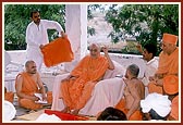 Swamishri blesses the satsang assembly in the mandir