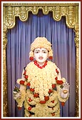 Shri Ghanshyam Maharaj attired in flowers