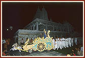 Thakorji in a decorated Rath is followed by youths