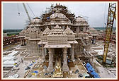 The murti being transported inside the monument