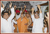 Devotees dance with joy before Swamishri in the mandir