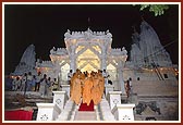 Descending mandir steps after darshan