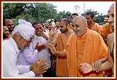 Swamishri meets and blesses the devotees