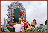 During the procession the utsav murti of Bhagwan Swaminarayan in different decorative floats 