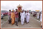 The traditional procession of Shri Harikrishna Maharaj in a palanquin as part of the Jal Jhilani festival 