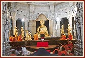 Swamishri before the murtis of Bhagwan Swaminarayan and Guru Parampara during the rituals of Pindika pujan