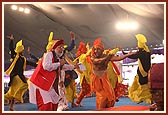The entire group of sikh youths and Shri Jasbir Singh perform bhangda before Swamishri