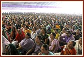 Women devotees during the evening assembly