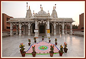 Rangoli on the mandir podium