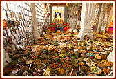 A grand annakut arranged in front of Thakorji in the mandir