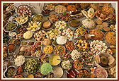 Varieties of sweets, 'farsan', cooked vegetables and cake modeled on Swaminarayan Akshardham and parikrama