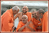 Swamishri in conversation with Doctor Swami and sadhus