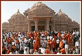 Sadhus and devotees descending the monument steps