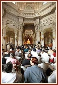 Swamishri blesses everyone, 'Yogiji Maharaj's wish was very strong and powerful which you have seen with its realization today. There is God. See how wonderful the darshan is.'