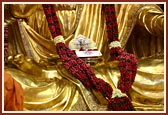 Shri Harikrishna Maharaj with the garlanded murti of Bhagwan Swaminarayan