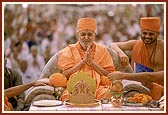 Swamishri engaged in yagna rituals