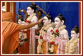 Swamishri performs murti-pratishtha pujan and arti of murtis for BAPS Swaminarayan Mandir, Bamangam