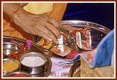 Swamishri performs pujan of instruments to be used during the foundation-stone laying ceremony