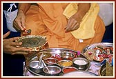 Swamishri performs pujan of instruments to be used during the foundation-stone laying ceremony