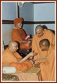 ... Swamishri blesses one of the participant sadhus