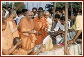 Swamishri performs the first stone-laying ceremony for the new three pinnacled BAPS Swaminarayan shikharbaddh mandir