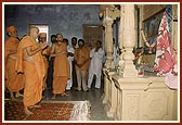 Engaged in Thakorji's darshan