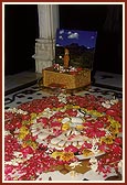 Swamishri doing darshan and pradakshina of memorial shrine of Brahmaswarup Yogiji Maharaj