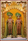 Shri Akshar Purushottam Maharaj adorned in sandalwood paste (chandan)